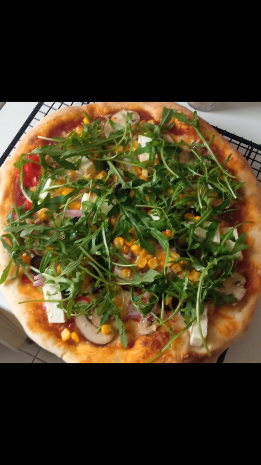 Proof that pizza doesn’t have to be junk food 🍕

Homemade pizza topped with cheese, feta, mushrooms, peppers, corn, olives, red onion, and a generous handful of arugula - OK, maybe I overdid arugula, but it's healthy 😅

#homemadepizza #pizzalover #doughandknow